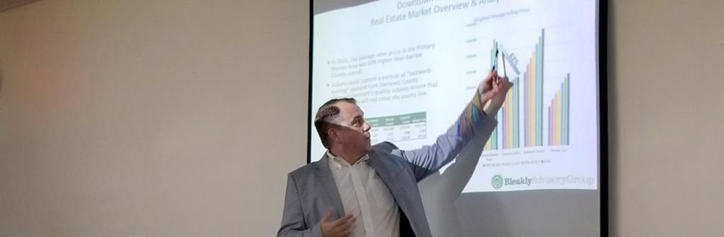 Geoff Koski presenting the Auburn Market Study